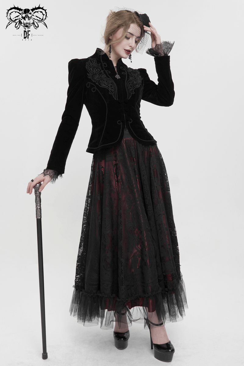 Women's gothic black velvet jacket featuring lace appliqué, paired with a long skirt for a vintage look.
