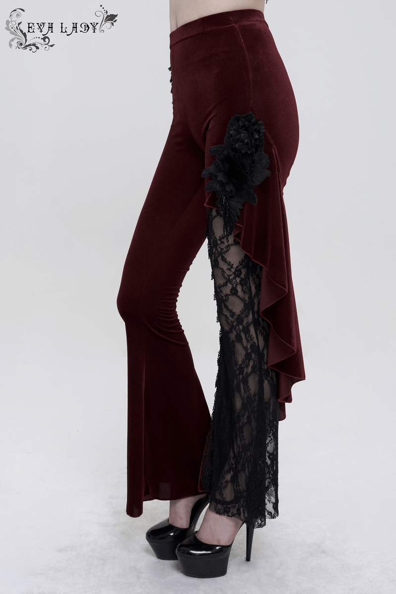 Model showcasing gothic wine red flared trousers with lace-up accents and ruffle details, perfect for a trendy wardrobe.