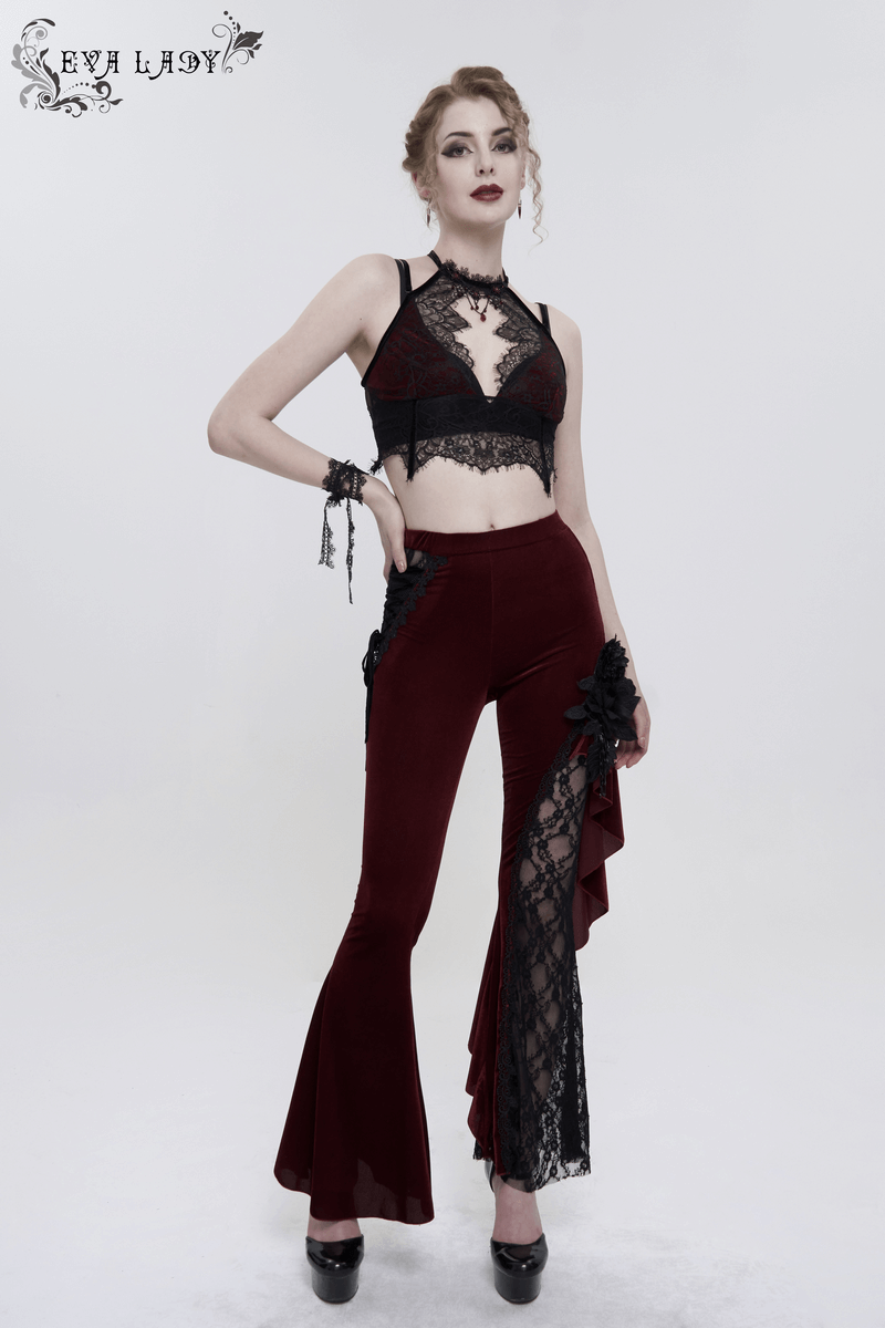 Model showcasing gothic wine red flared trousers with lace-up accents and matching lace crop top.
