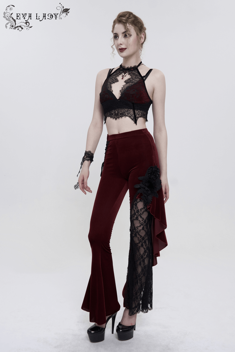 Gothic wine red flared trousers with lace-up accents, paired with a stylish black lace crop top.