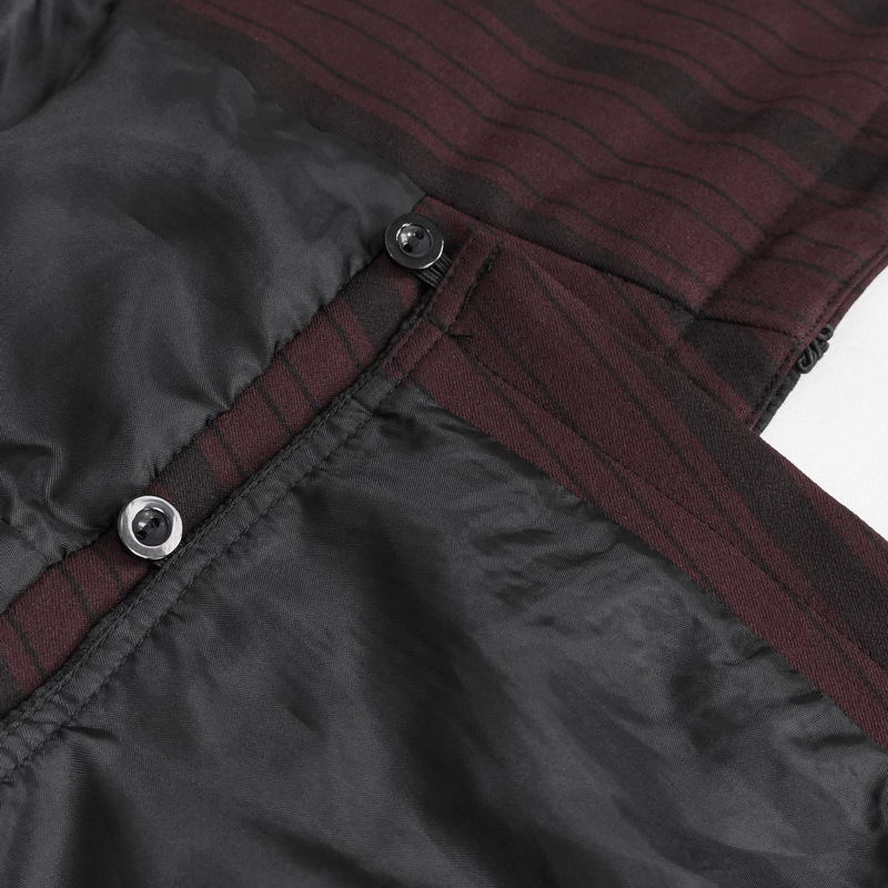 Close-up of gothic waistcoat fabric, showcasing wine red stripes and black interior, emphasizing stylish details and buttons.