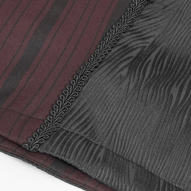 Close-up of elegant gothic waistcoat featuring wine red stripes and intricate black detailing.