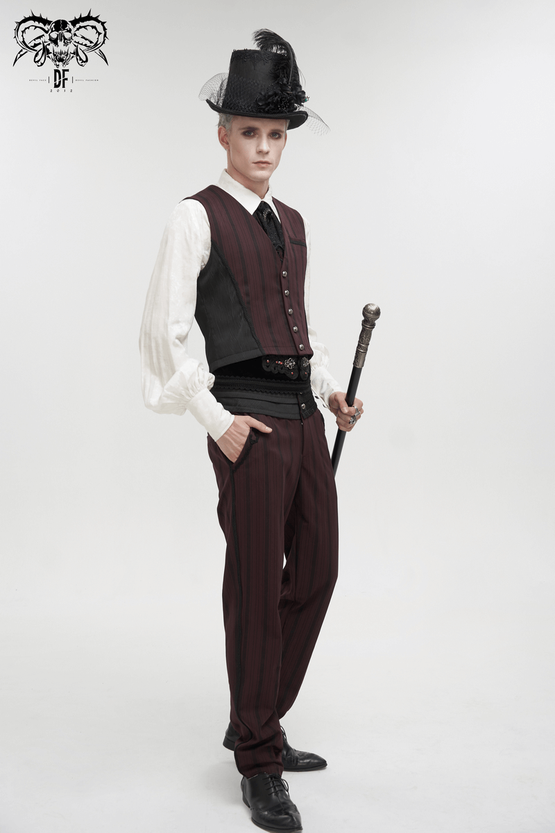 Stylish male model wearing a gothic wine red striped waistcoat with a swallow tail and top hat.
