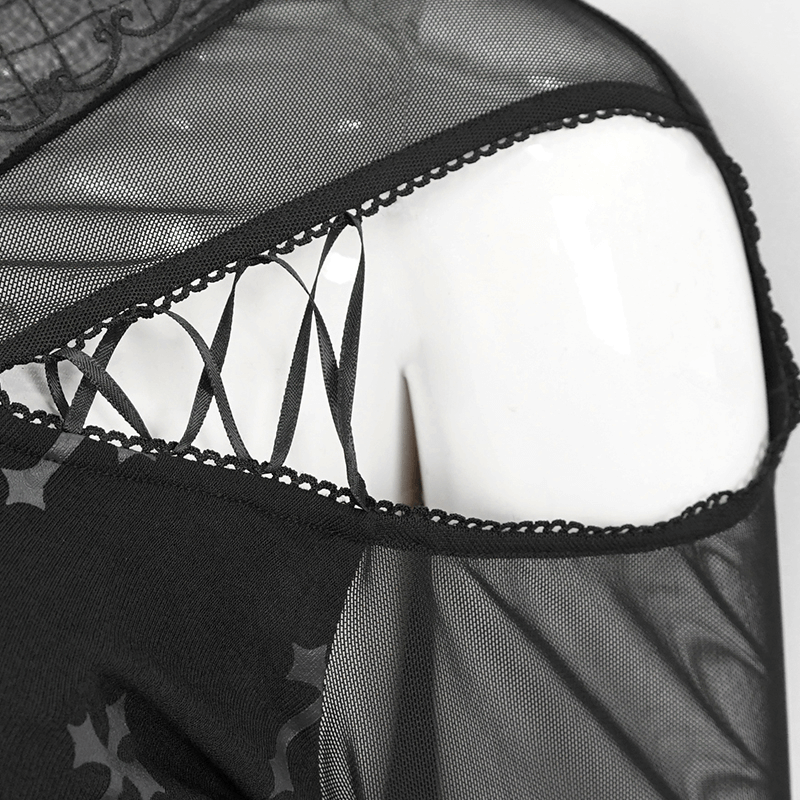 Close-up of gothic women's off-shoulder dress showing intricate mesh detailing and cross print accents.