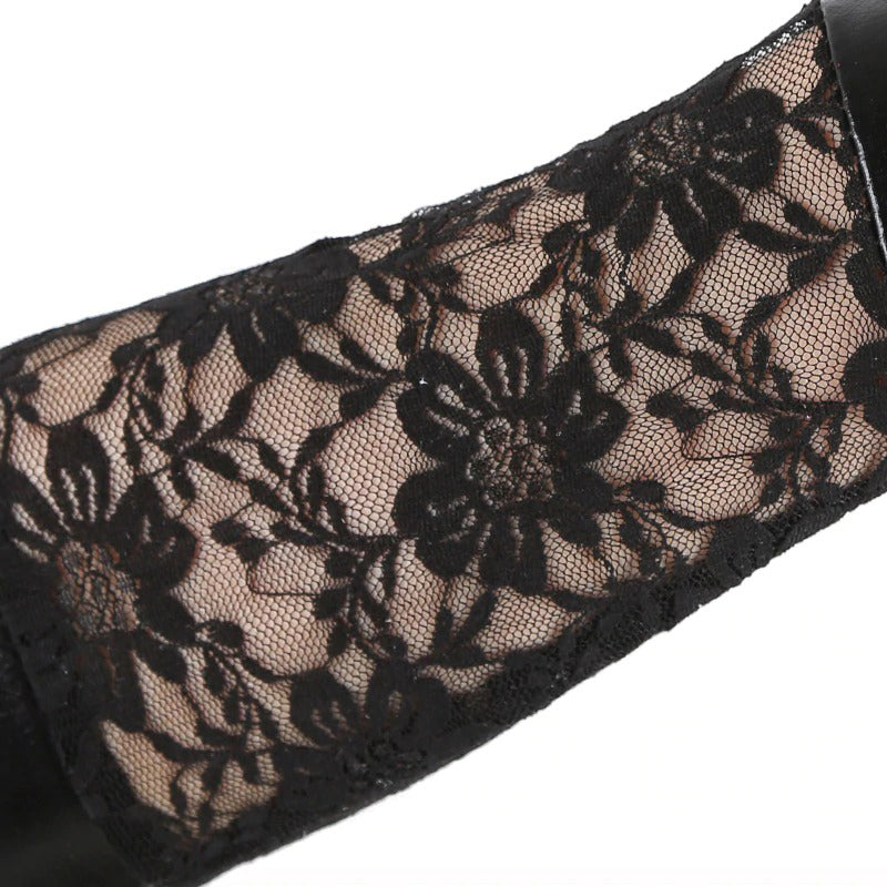 Elegant black lace detail on gothic long leather gloves, perfect for alternative fashion and witch-inspired accessories.