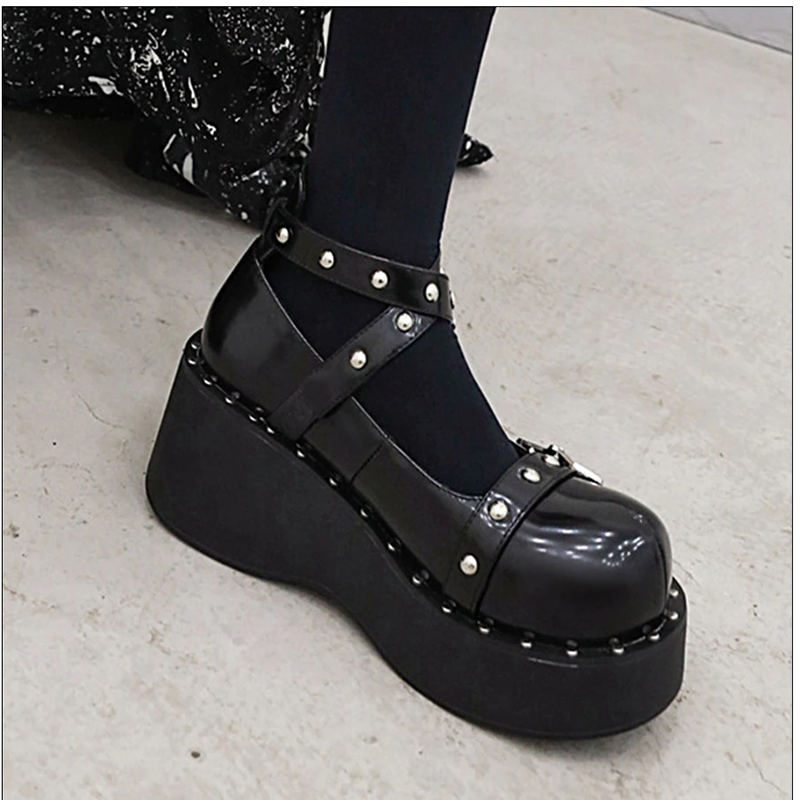 Gothic women wedges pumps on platform with rivets, perfect for autumn fashion, showcasing stylish patent leather design.