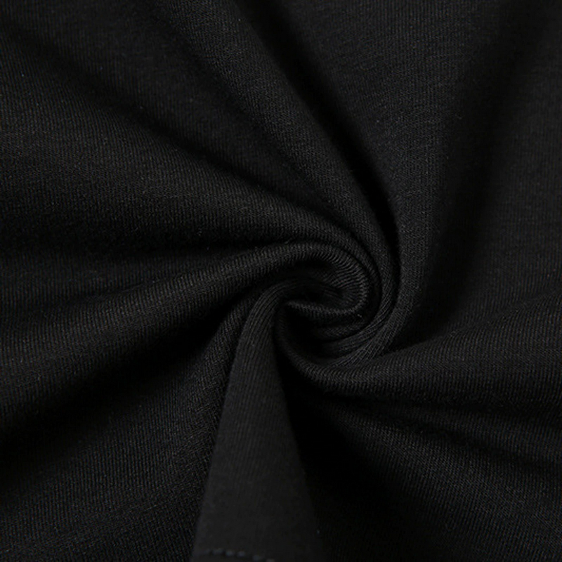 Close-up of soft, black fabric showcasing the quality of a gothic women's crop top.