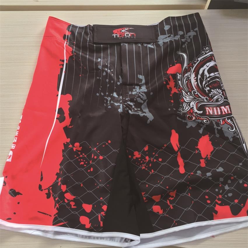 Men's boxing shorts in black and red with skull print, perfect for training and casual wear.