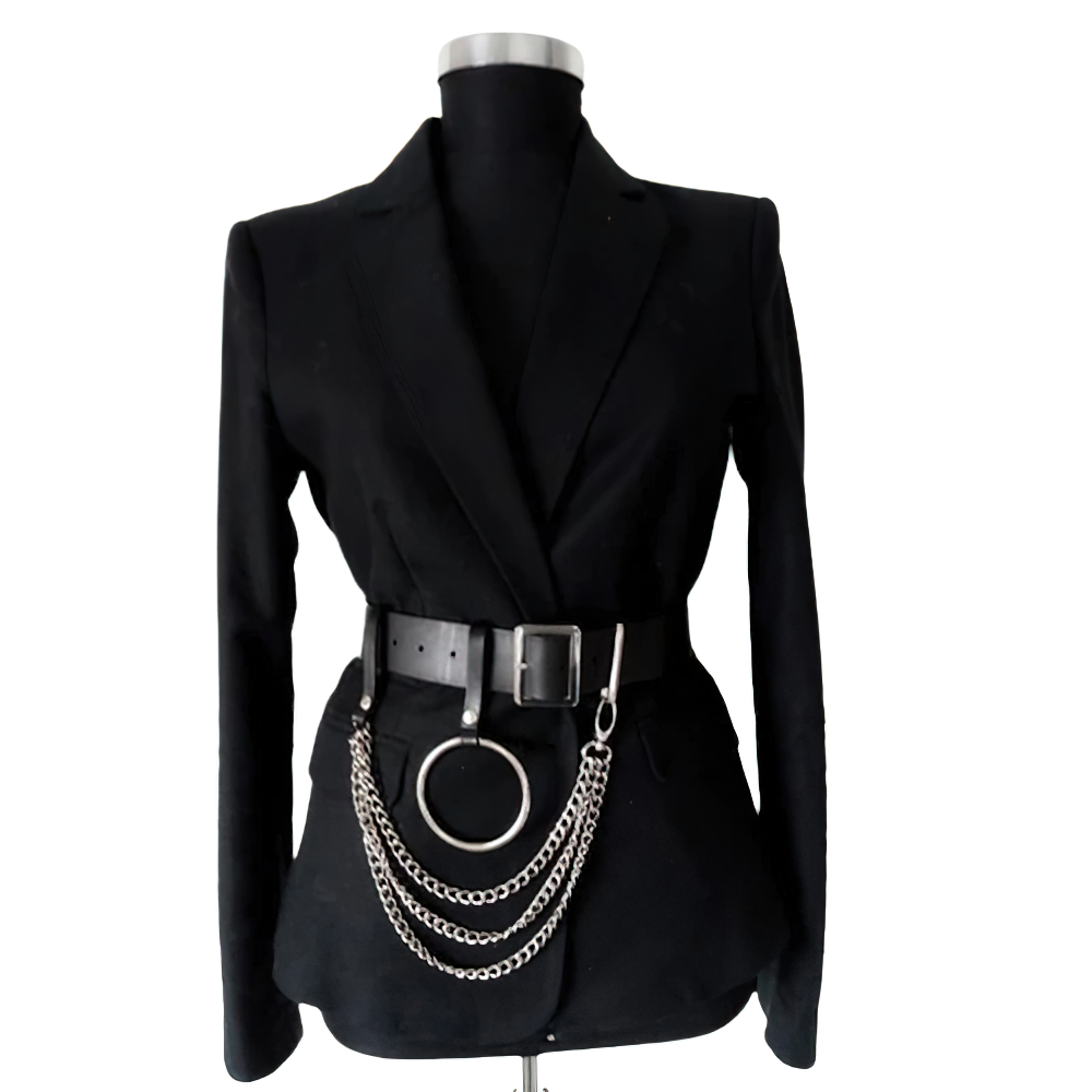 Gothic women's faux leather belt with metal chains showcased on a black tailored blazer.