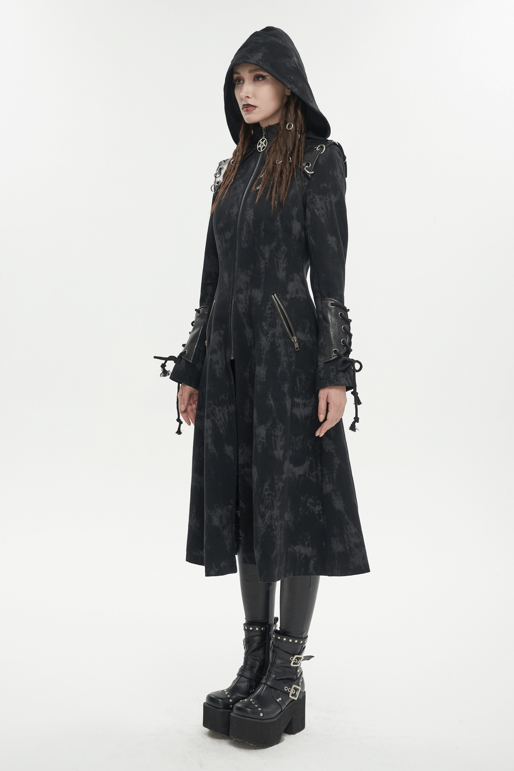 Gothic women's hooded coat showcasing dark and edgy style, paired with stylish platform boots.