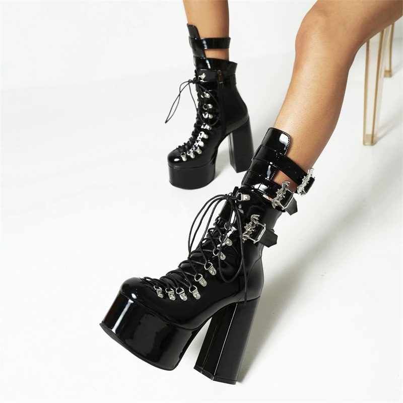 Gothic women's patent leather high heel boots with bat buckle and lace-up design, perfect for a fashionable look.