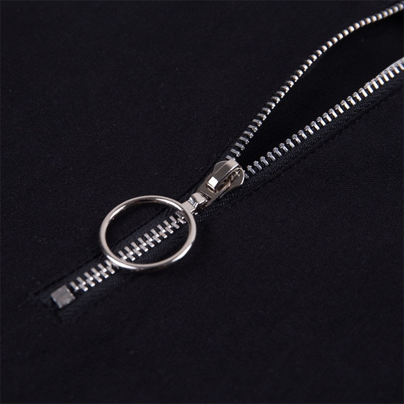 Close-up of a stylish black zipper detail on Gothic women's pencil pants, adding a chic touch to the outfit.