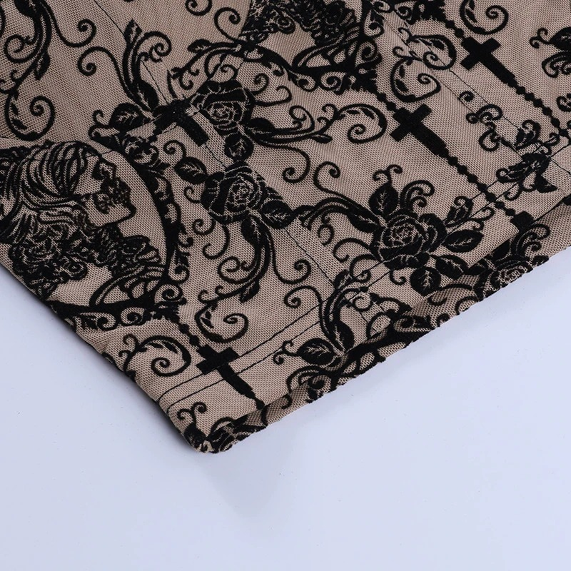Gothic floral print fabric featuring intricate designs and skull motifs, perfect for a vintage aesthetic top.