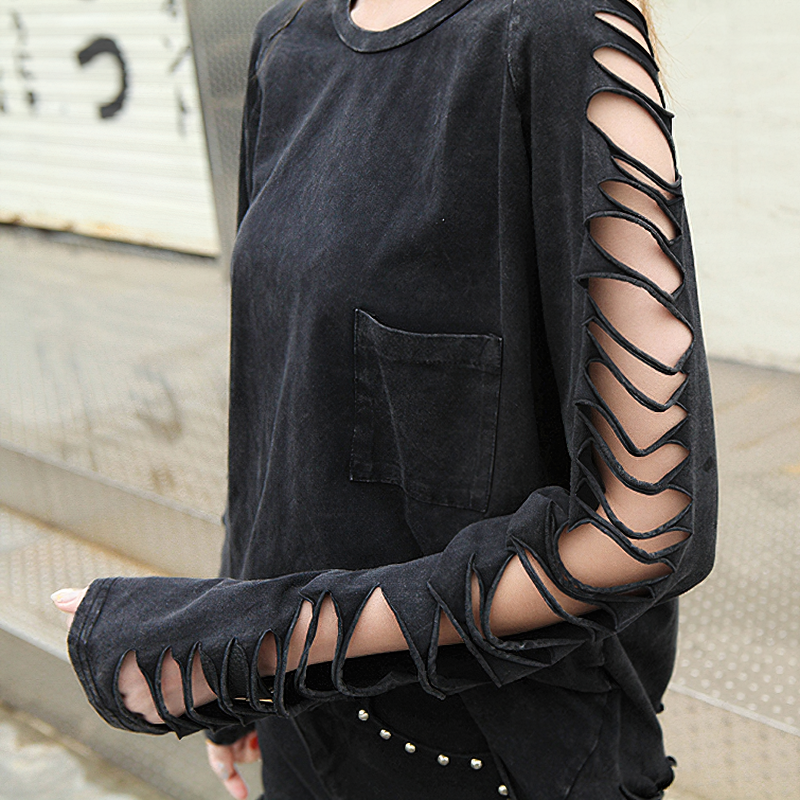 Black women's long sleeve gothic t-shirt with stylish torn sleeves, perfect for a unique and comfortable look.