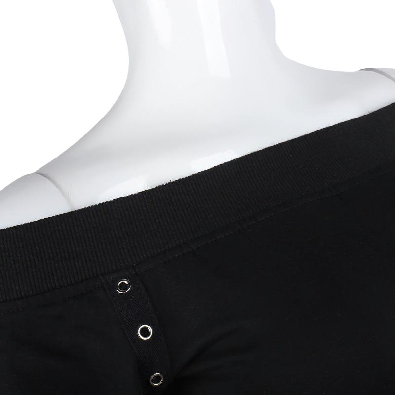 Close-up of women's black gothic crop top with off-shoulder design and silver rivets showcasing trendy streetwear style.