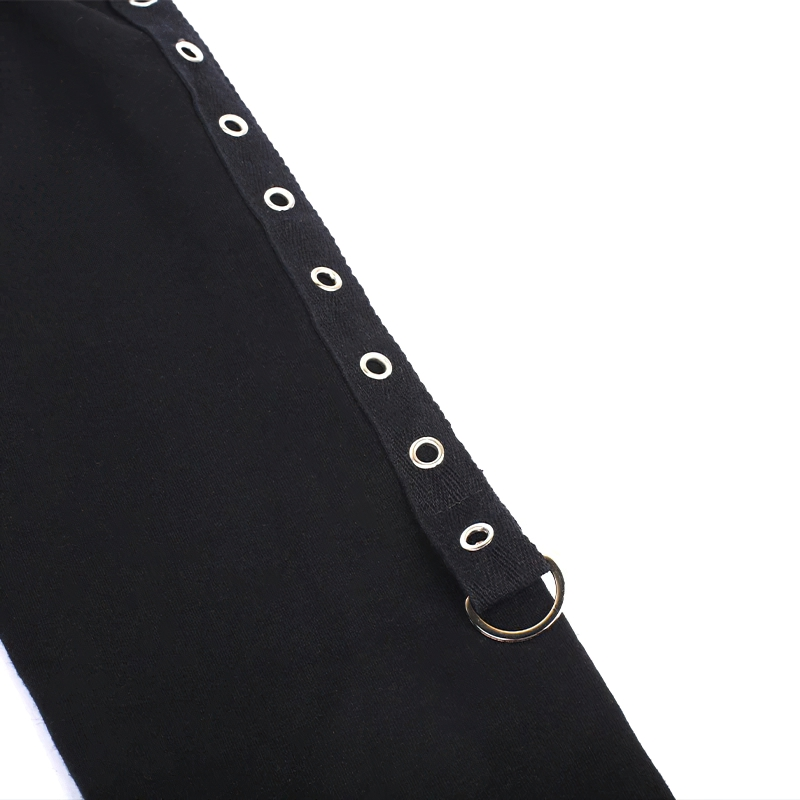 Close-up of a black fabric featuring silver rivets and a ring detail for a gothic women's top style.