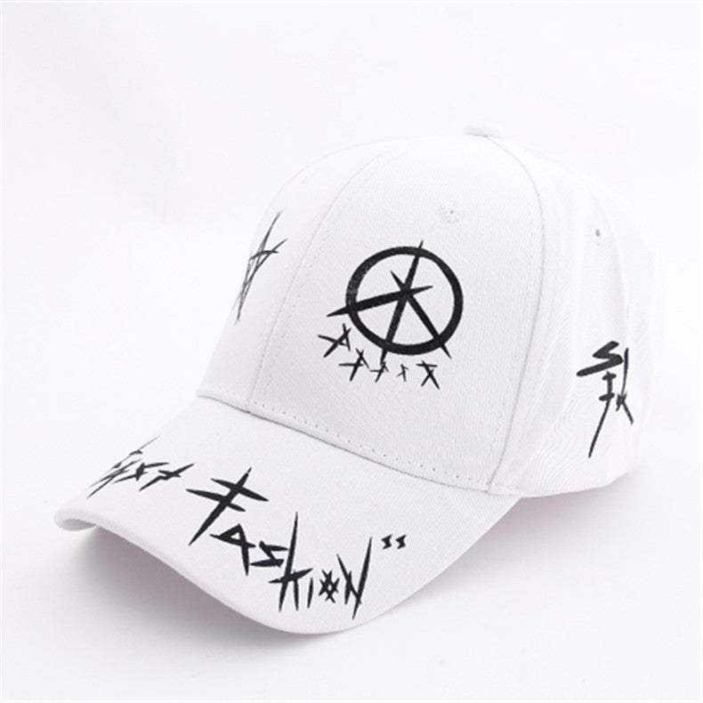 White baseball cap with black graffiti design, featuring a peace symbol, stylish and unisex fashion accessory.