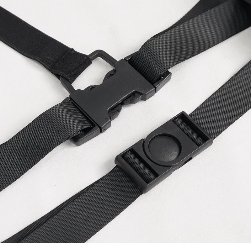 Close-up of durable black straps with a secure buckle for adjustable fit and comfort in fashion accessories.