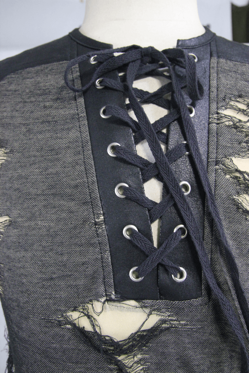 Close-up of men's grunge tank top featuring crisscross lacing detail on neckline and distressed fabric.