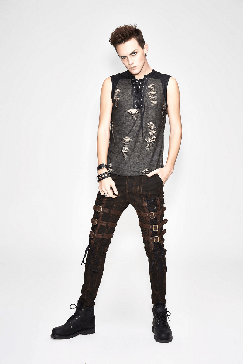 Model showcasing a men's grunge-style tank top with distressed design and crisscross lacing.