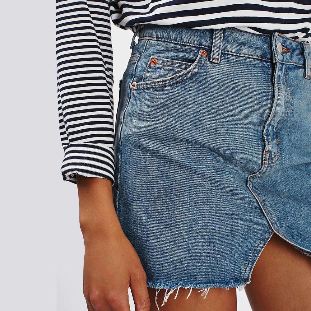 Grunge style high waist denim mini skirt with pockets, perfect for casual outfits and street fashion adventures.
