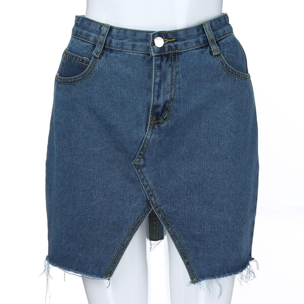 Grunge style high waist A-line mini skirt in blue denim with unique hollow cut and pockets, perfect for casual outfits.