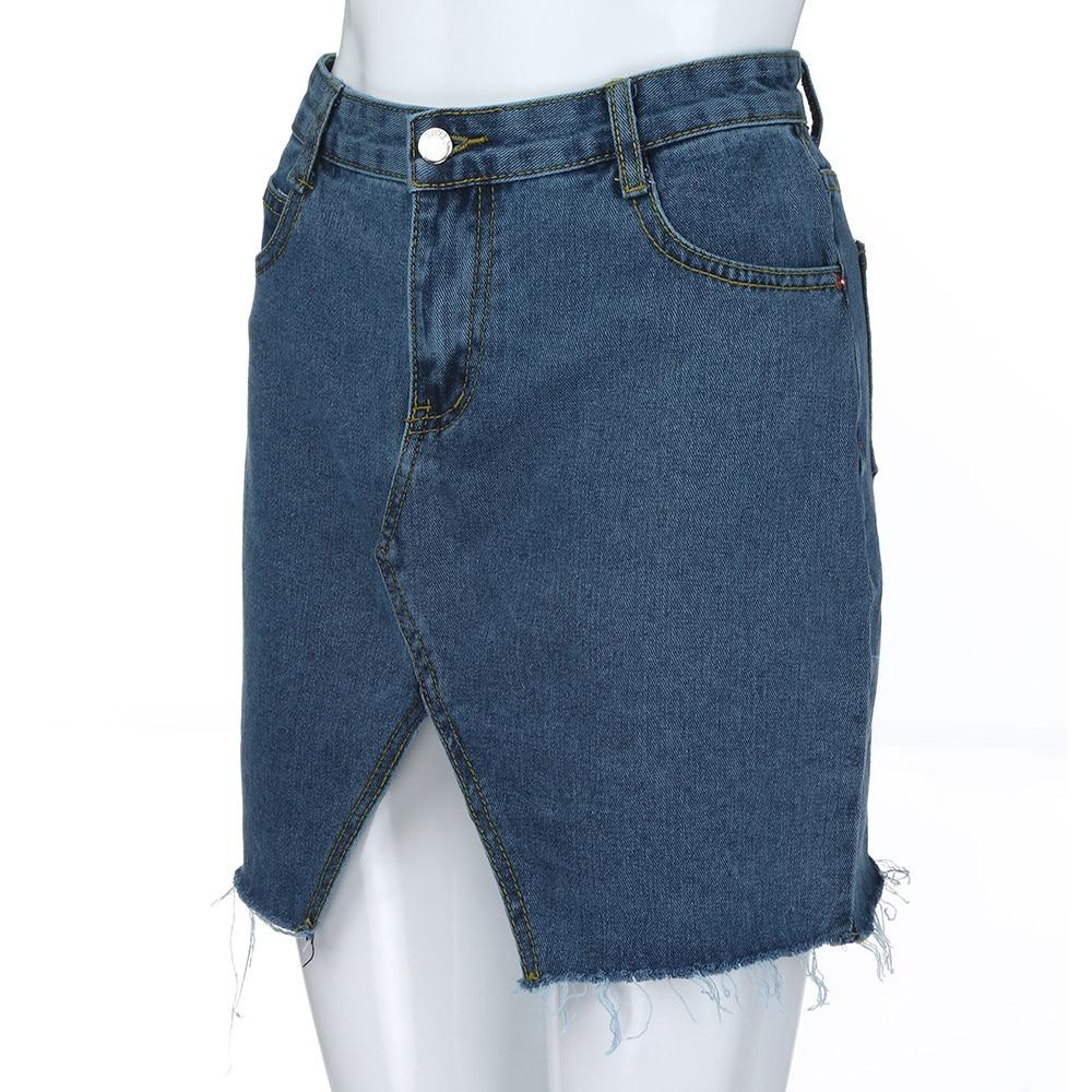 High-waist blue denim A-line mini skirt with hollow detail and frayed hem, perfect for grunge outfits.