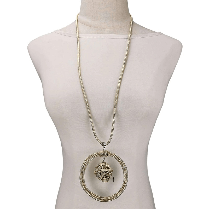 Handmade punk style metal necklace with round pendants displayed on a mannequin.