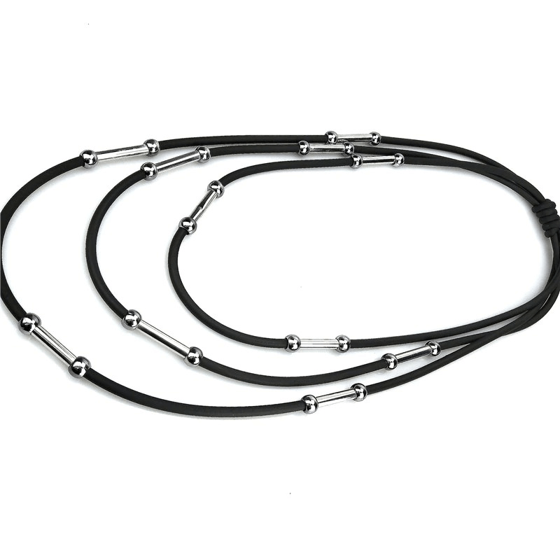 Handmade women's black rubber necklace with stylish silver accents, perfect for casual outfits and bohemian style.