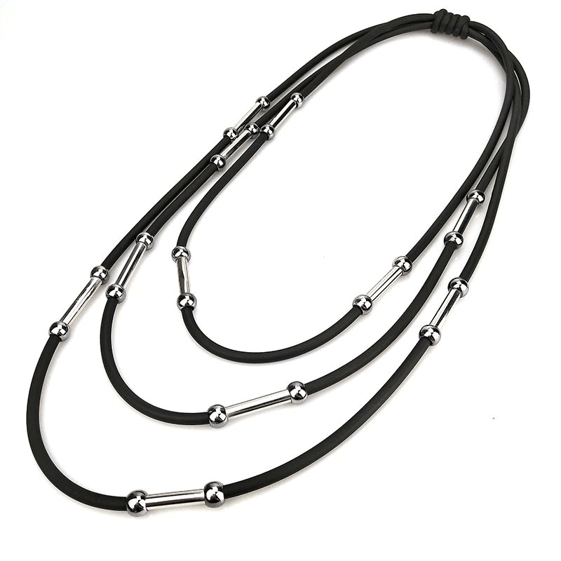 Handmade women's black rubber necklace with silver accents, perfect for casual Bohemian style outfits.