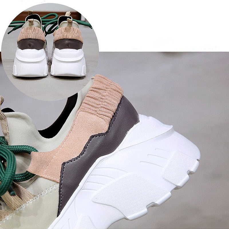 Stylish women's high platform running shoes featuring soft fabric and elastic bands for comfort and support.