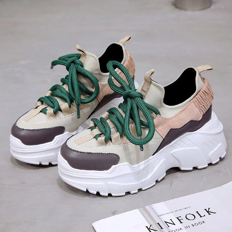 Stylish women's height increasing platform sneakers with green laces, perfect for running and daily wear.