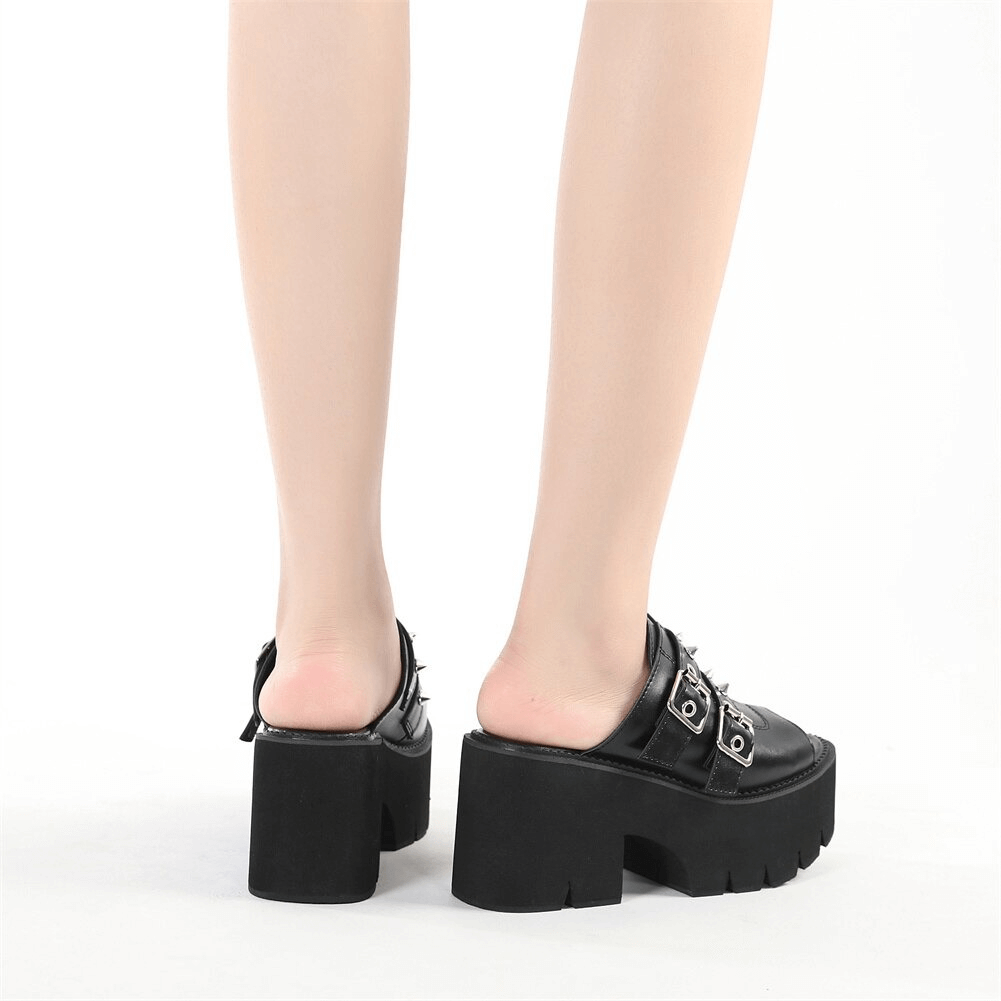 Black PU leather chunky platform sandals for women with buckles and spikes, stylish and comfortable casual footwear.