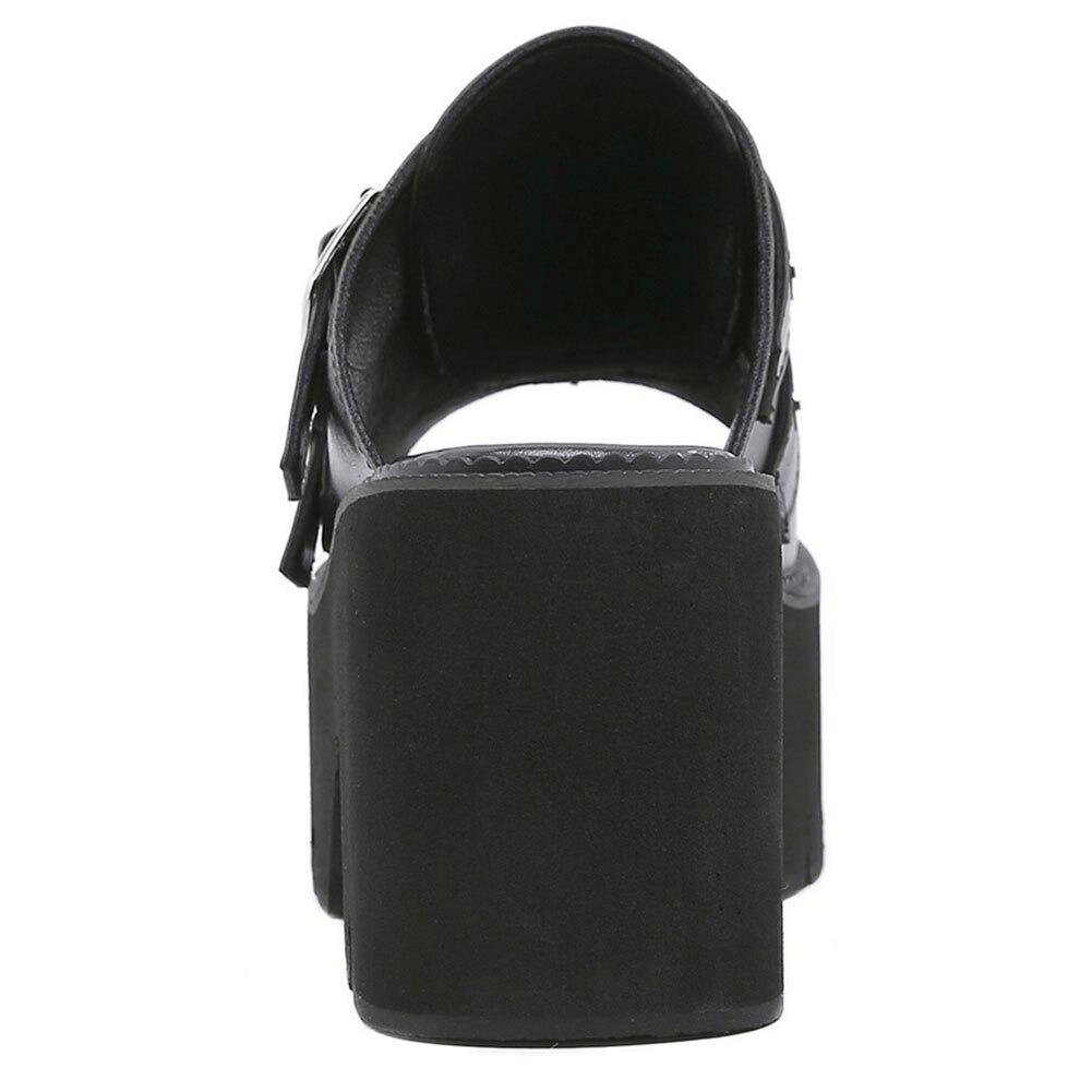 Back view of trendy women's black platform sandals with buckles and spikes, showcasing chunky heel design.