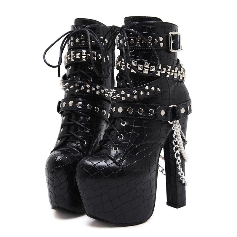 High heels ankle boots with chains and rivets, black patent leather platform footwear for stylish Gothic looks.