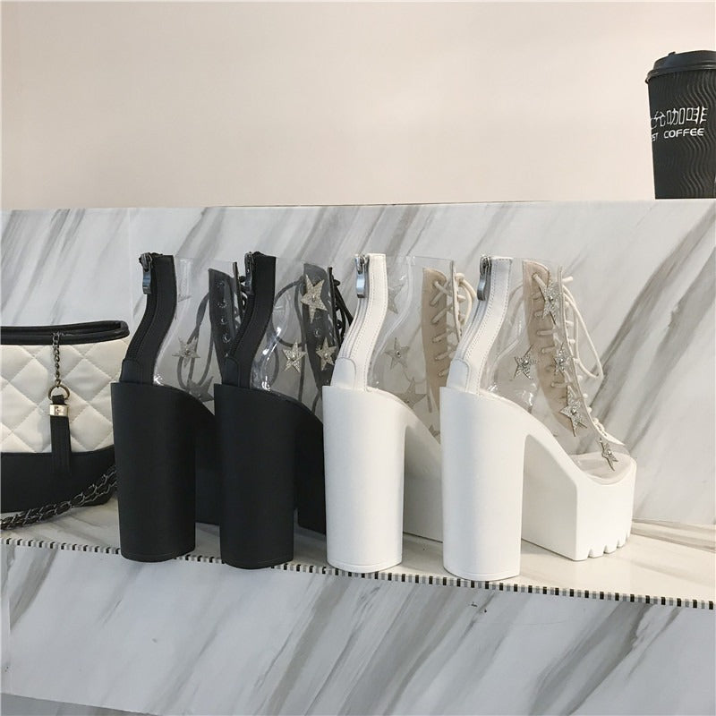 High heels women sandals boots in black and white, punk style lace-up PVC star crystal platform shoes on display.