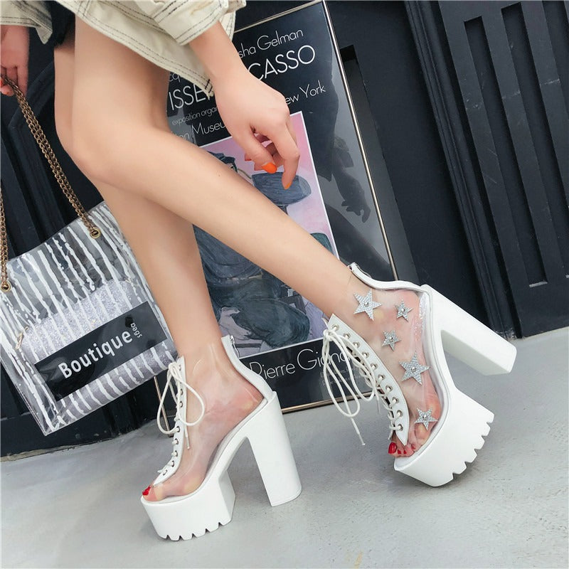 White punk style lace-up platform sandals with star crystal accents and PVC panels for women.