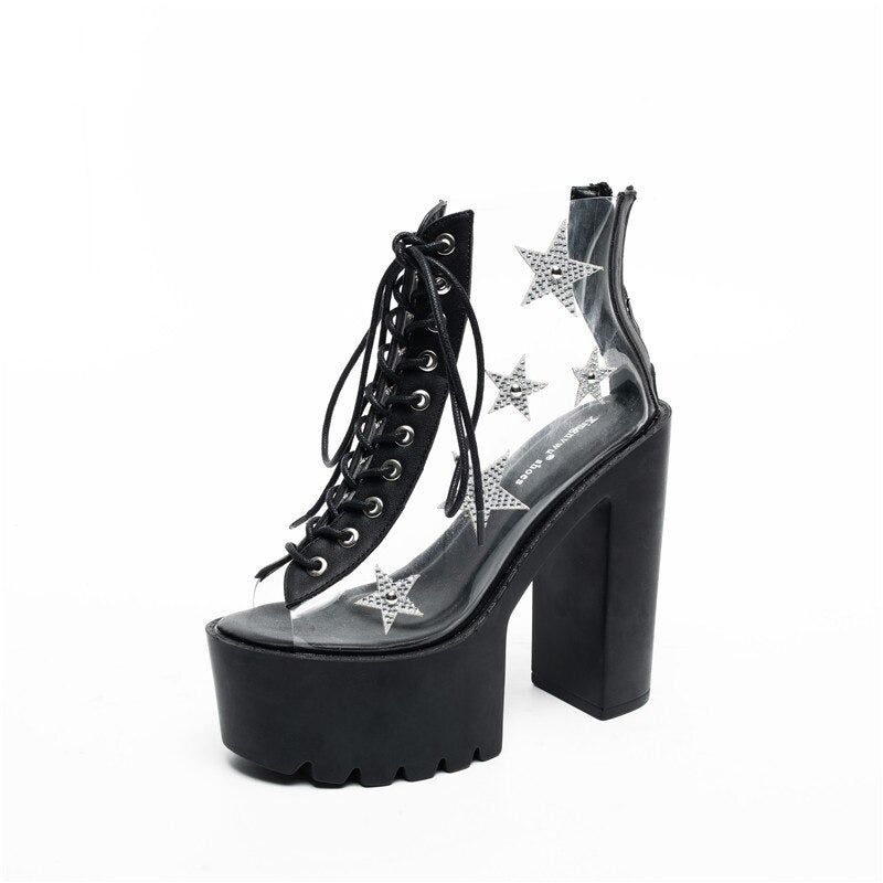 Punk style star crystal platform boots with PVC panels and lace-up design, featuring a chic 8 cm high heel.