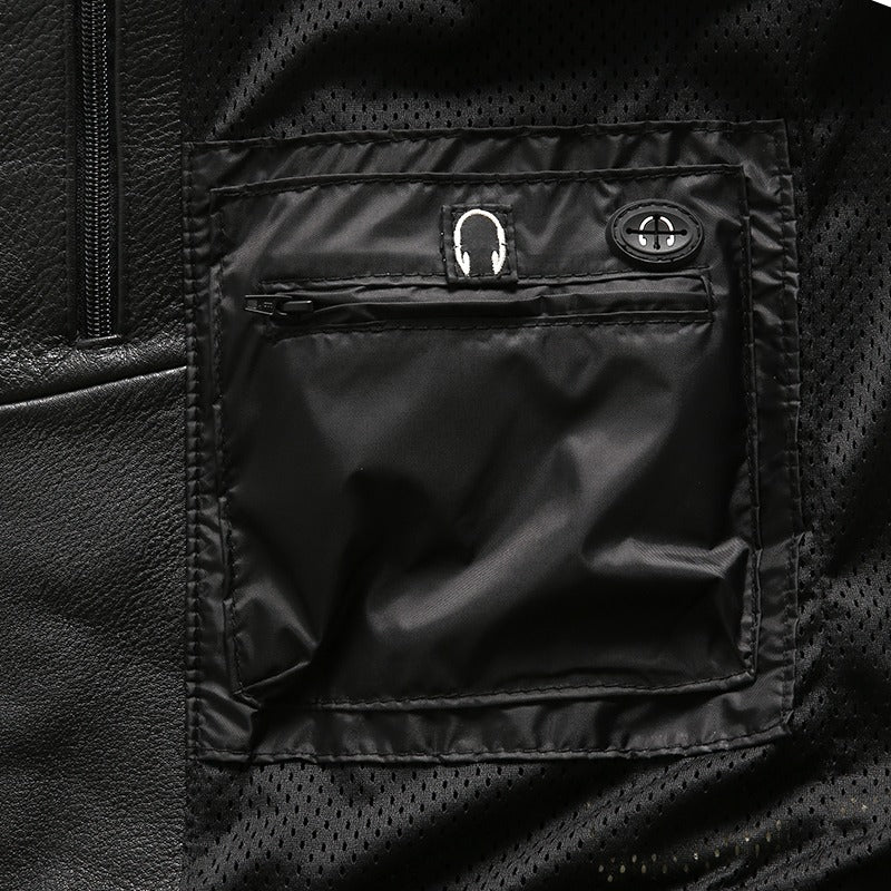 Close-up of a black motorcycle vest showing a zippered pocket and stylish design details.