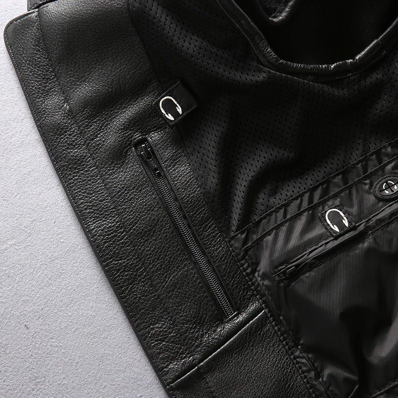 Close-up of a men's genuine leather motorcycle biker vest showcasing zippers and sleek black fabric for a stylish look.