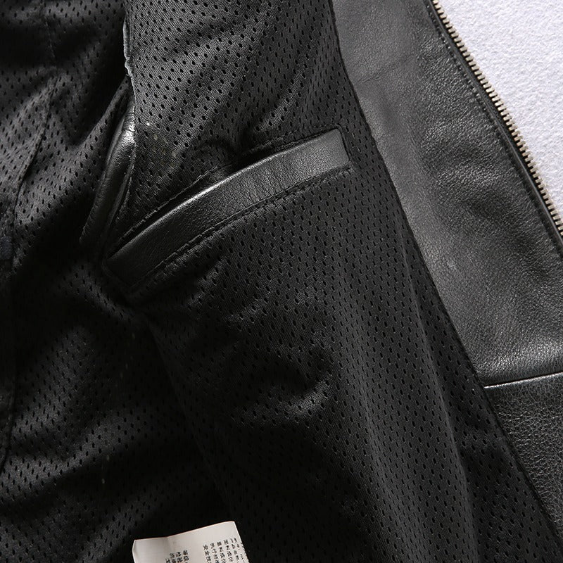 Interior view of a men's professional motorcycle biker vest showcasing breathable mesh lining and sleek leather details.