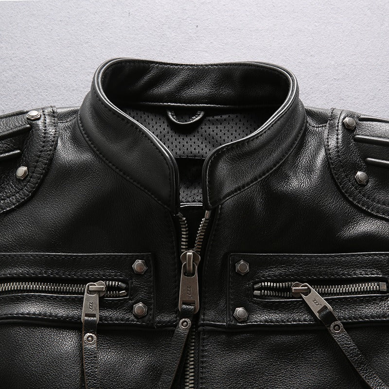 Close-up of a stylish men's motorcycle biker vest featuring a sleek black leather design and detailed zippers.