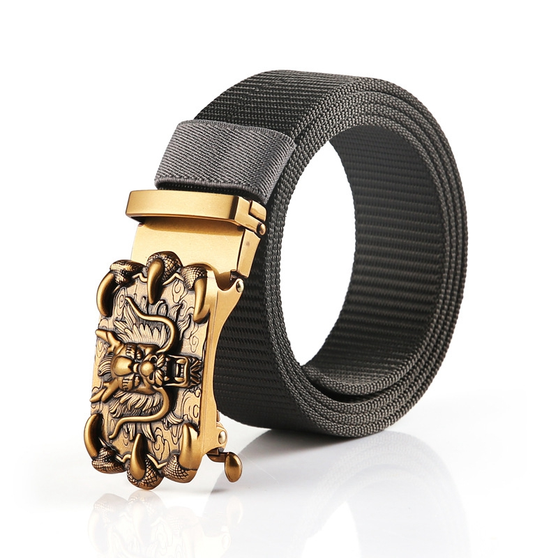 Stylish nylon belt for men and women with ornate metal buckle in rock style, perfect for trendy outfits.
