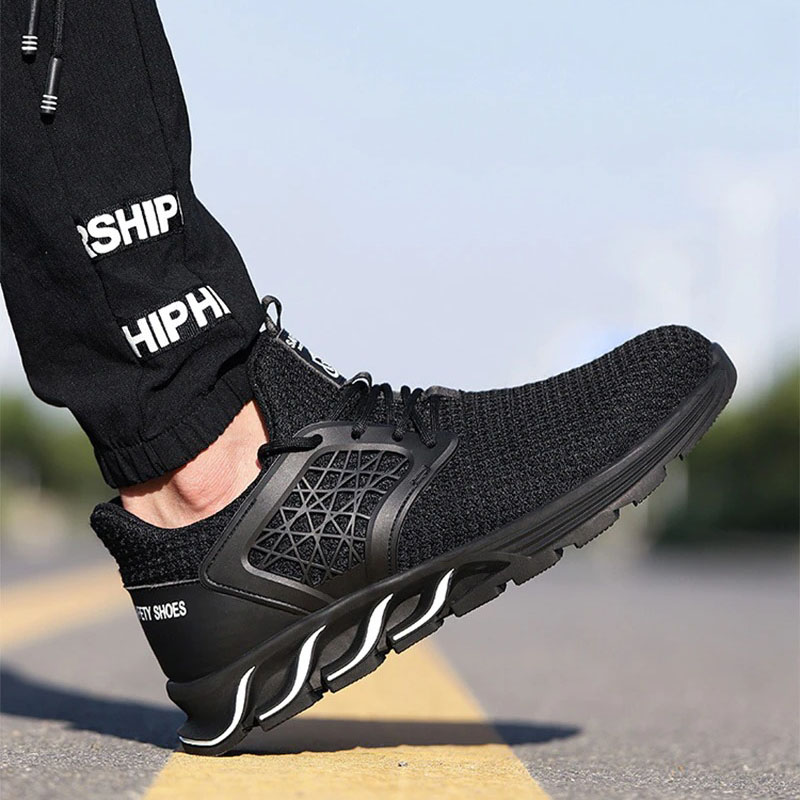 Men's black breathable work safety sneakers with stylish design and steel toe protection.