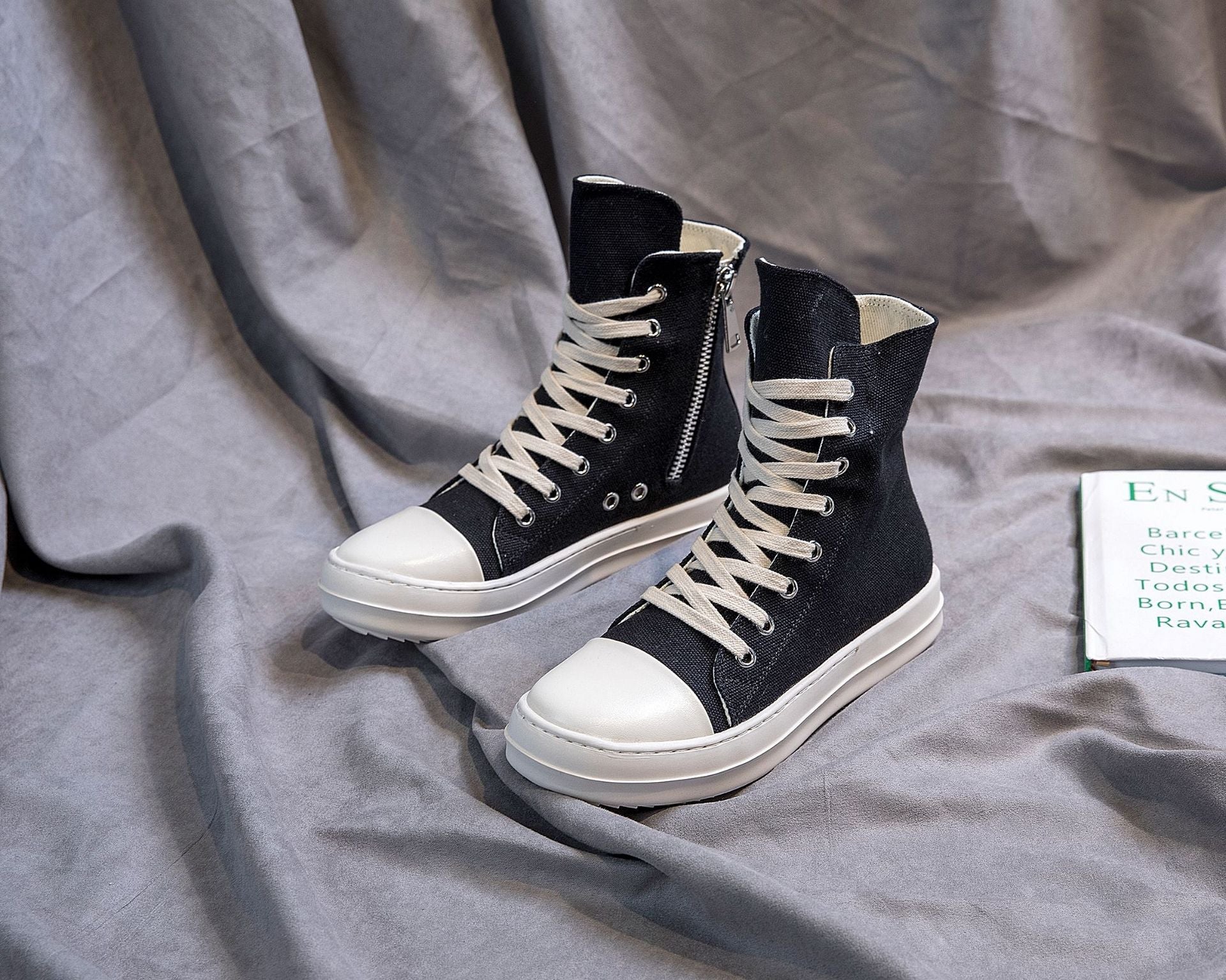 Retro high top black platform sneakers with white laces, perfect for alternative fashion and rock lovers.