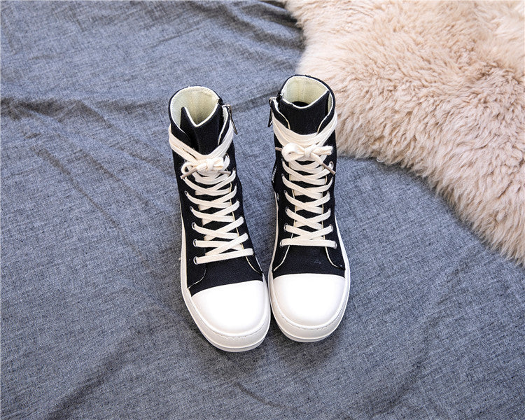 High top retro platform sneakers for rock lovers in black and white, perfect for unisex alternative fashion.