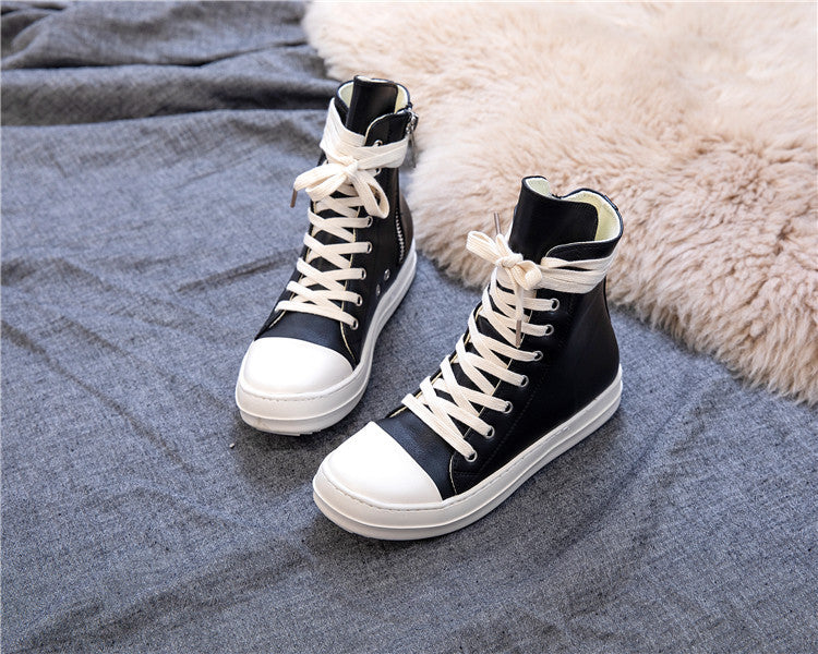 Stylish black and white high top platform sneakers for retro rock lovers, perfect for unisex alternative fashion.