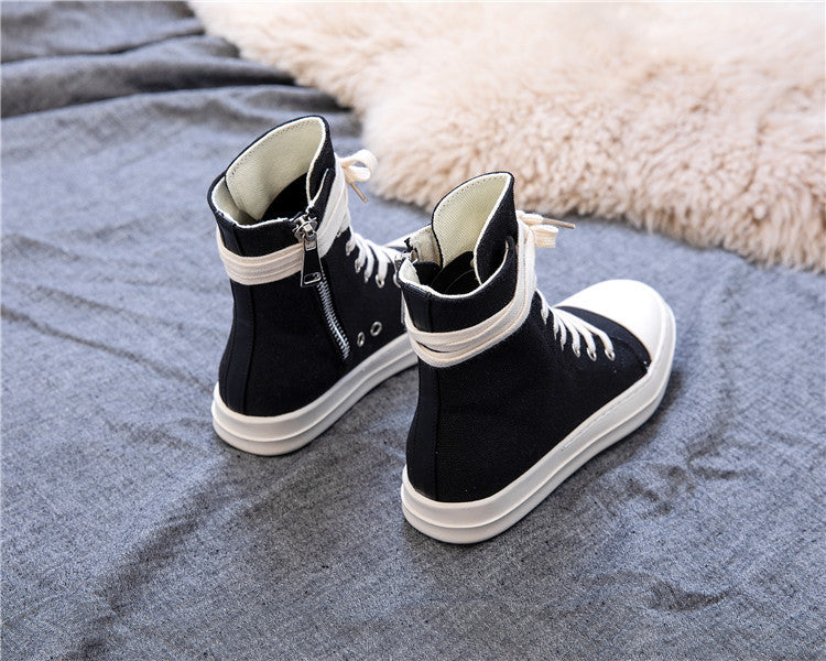 High top black retro platform sneakers with white soles, stylish unisex shoes for rock lovers.