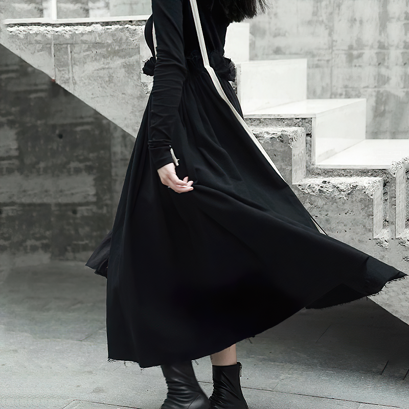 Stylish high waist black skirt with white straps, perfect for vintage streetwear looks, showcased in a modern setting.