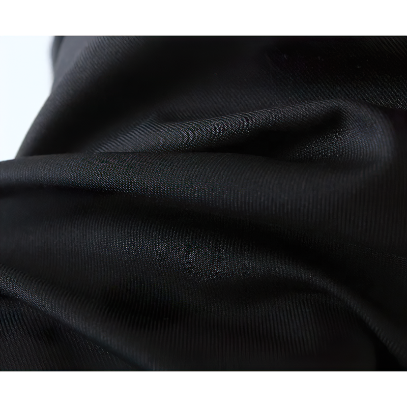 Close-up of soft black fabric, perfect for high waist black pleated women's pants with a chic and fashionable look.